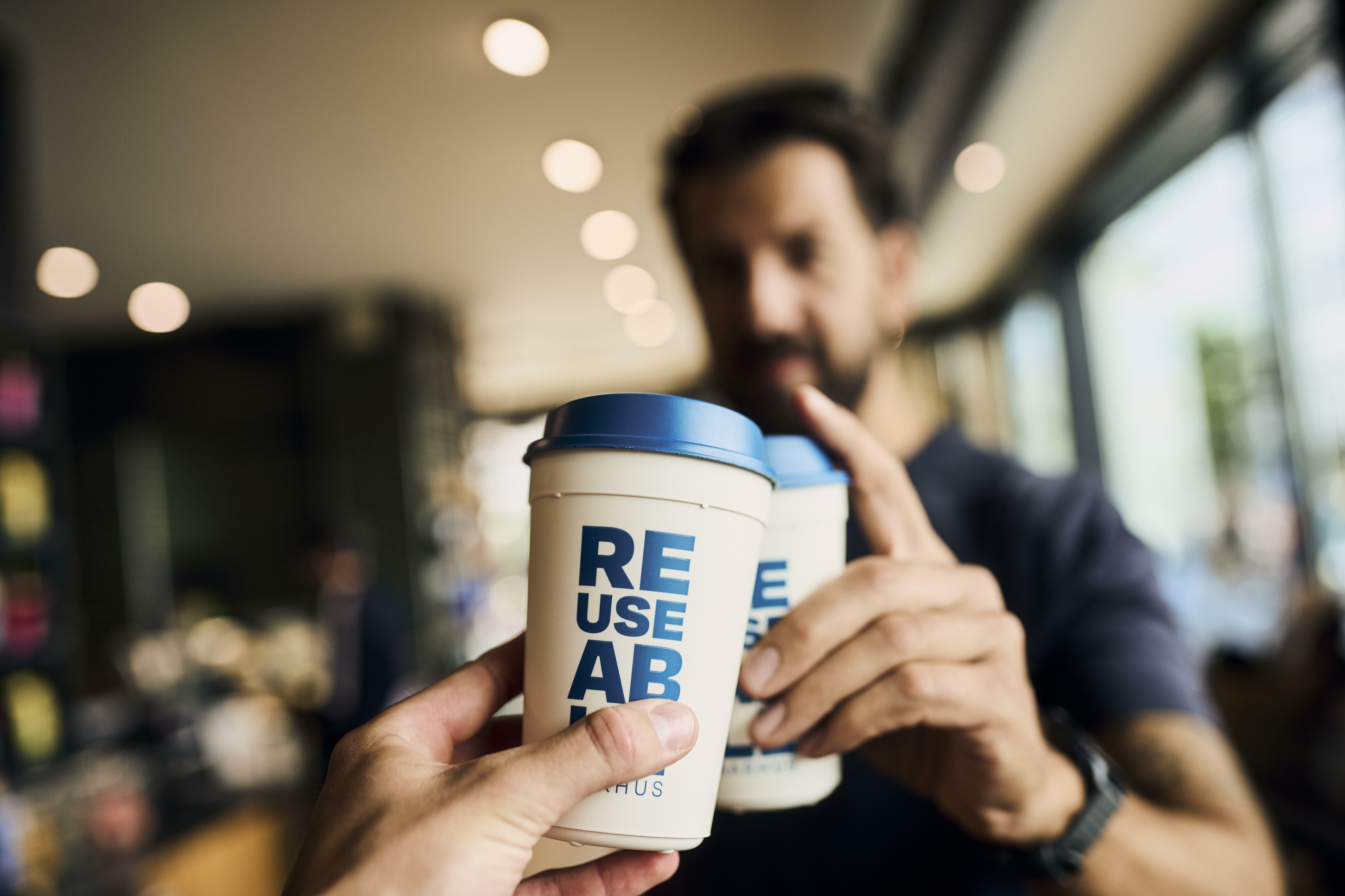 REUSEABLE coffee cups part of Aarhus' open managed system for reusable takeaway packaging, powered by TOMRA.
